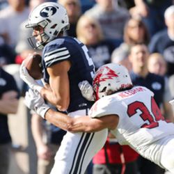 Brigham Young Cougars wide receiver Nick Kurtz (5) catches a touchdwon past Southern Utah Thunderbirds linebacker Mike Needham (34)  in Provo on Saturday, Nov. 12, 2016.  