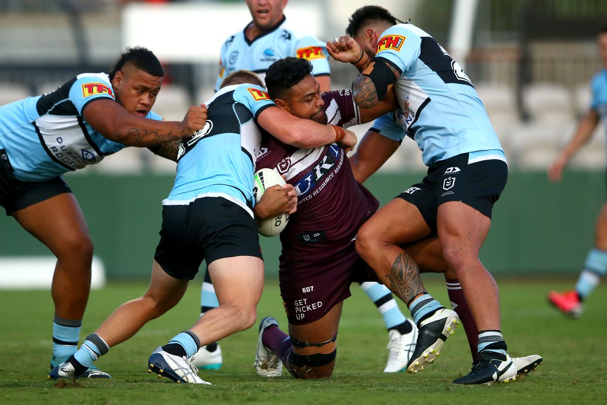 Toafofoa Sipley of the Sea Eagles is tackled during the NRL trial match between the Cronulla Sharks and the Manly Warringah Sea Eagles at Netstrata Jubilee Stadium on March 01, 2020 in Sydney, Australia.