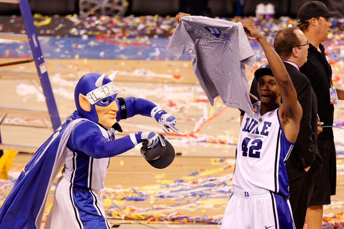 INDIANAPOLIS - APRIL 05: The mascot and Lance Thomas #42 of the Duke Blue Devils celebrate on court after they won 61-59 against the Butler Bulldogs during the 2010 NCAA Division I Men's Basketball National Championship game at Lucas Oil Stadium on A