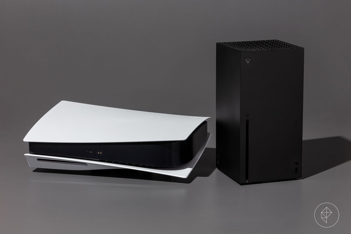 a PlayStation 5 sitting horizontally next to an Xbox Series X, photographed on a dark gray background