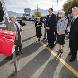 Stan Rosenzweig, a member of the American Red Cross' Greater Salt Lake board, points out the features on one of 10 new emergency response vehicles to Bishop W. Christopher Waddell, second counselor in The Church of Jesus Christ of Latter-day Saints' Presiding Bishopric, Sister Jean B. Bingham, general president of the church's Relief Society, and Bishop Dean M. Davies, first counselor in the church's Presiding Bishopric during a press conference in Murray on Friday, Oct. 26, 2018. The church donated $1.5 million to the American Red Cross for the new vehicles.