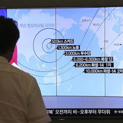 In this Aug. 10, 2017 photo, a man watches a TV screen showing a local news program reporting on North Korea's missiles, at the Seoul Railway Station in Seoul, South Korea. Tensions between the United States and North Korea tend to flare up suddenly and then fade away almost as quickly, but the latest escalation won't likely go away quite so easily.  