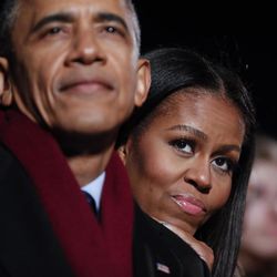 In this photo taken Dec. 1, 2016, first lady Michelle Obama and President Barack Obama watch the musical performances at the 2016 National Christmas Tree lighting ceremony at the Ellipse near the White House in Washington. What does Michelle Obama do next? After eight years as a high-profile advocate against childhood obesity, a sought-after talk show guest, a Democratic power player and a style maven, the first lady will have her pick of options when she leaves the White House next month. 