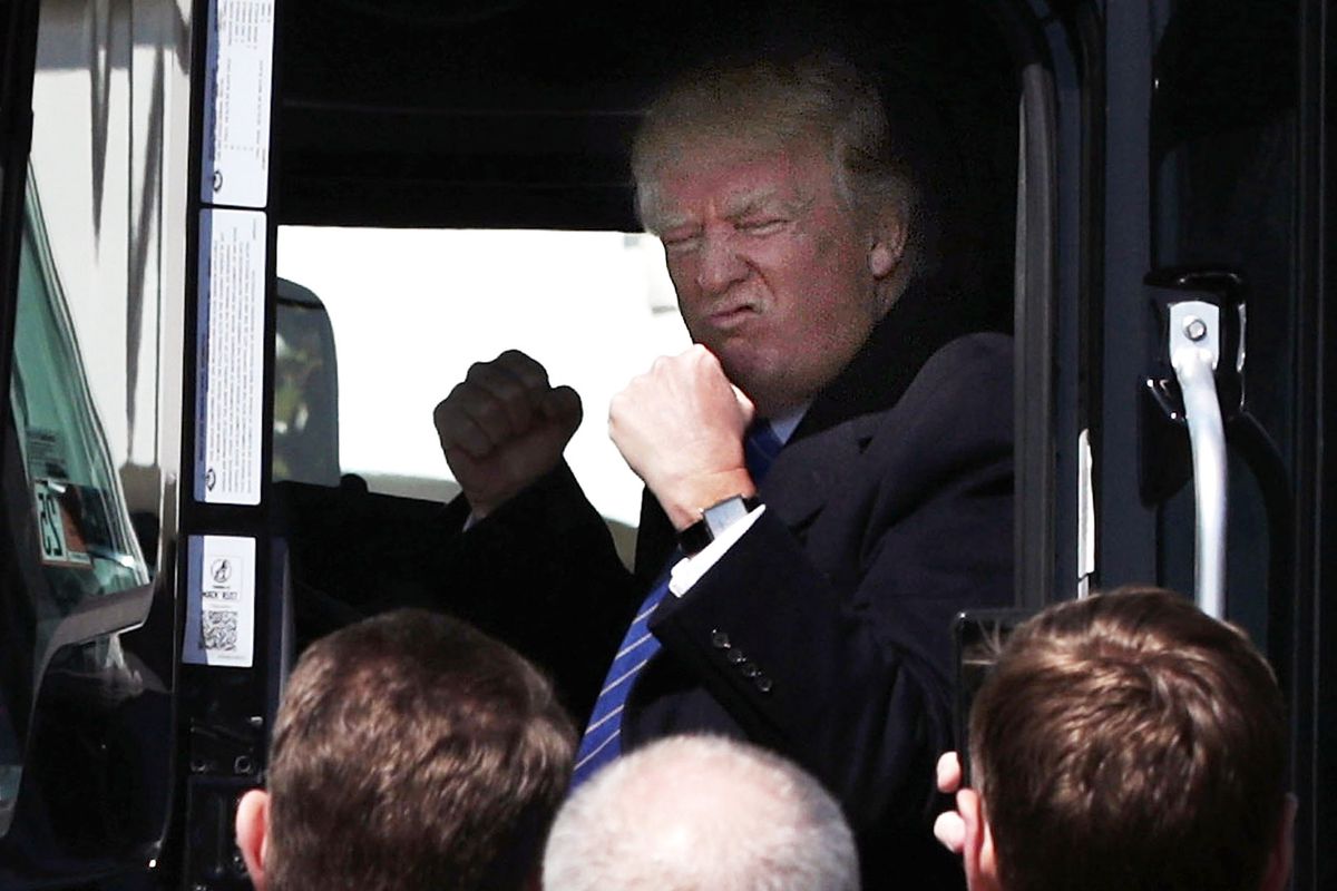President Donald Trump in a truck.