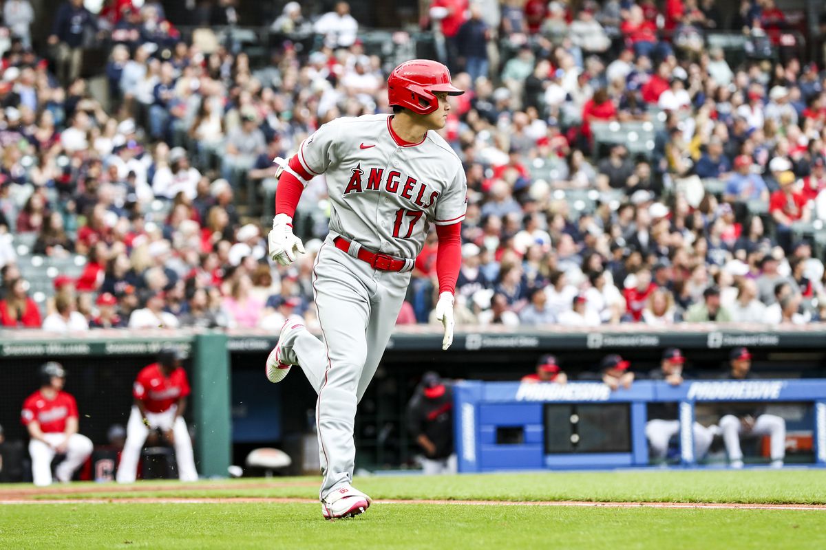 Shohei Ohtani of the Los Angeles Angels rounds the bases after hitting an RBI double during the third inning against the Cleveland Guardians at Progressive Field on May 13, 2023 in Cleveland, Ohio.