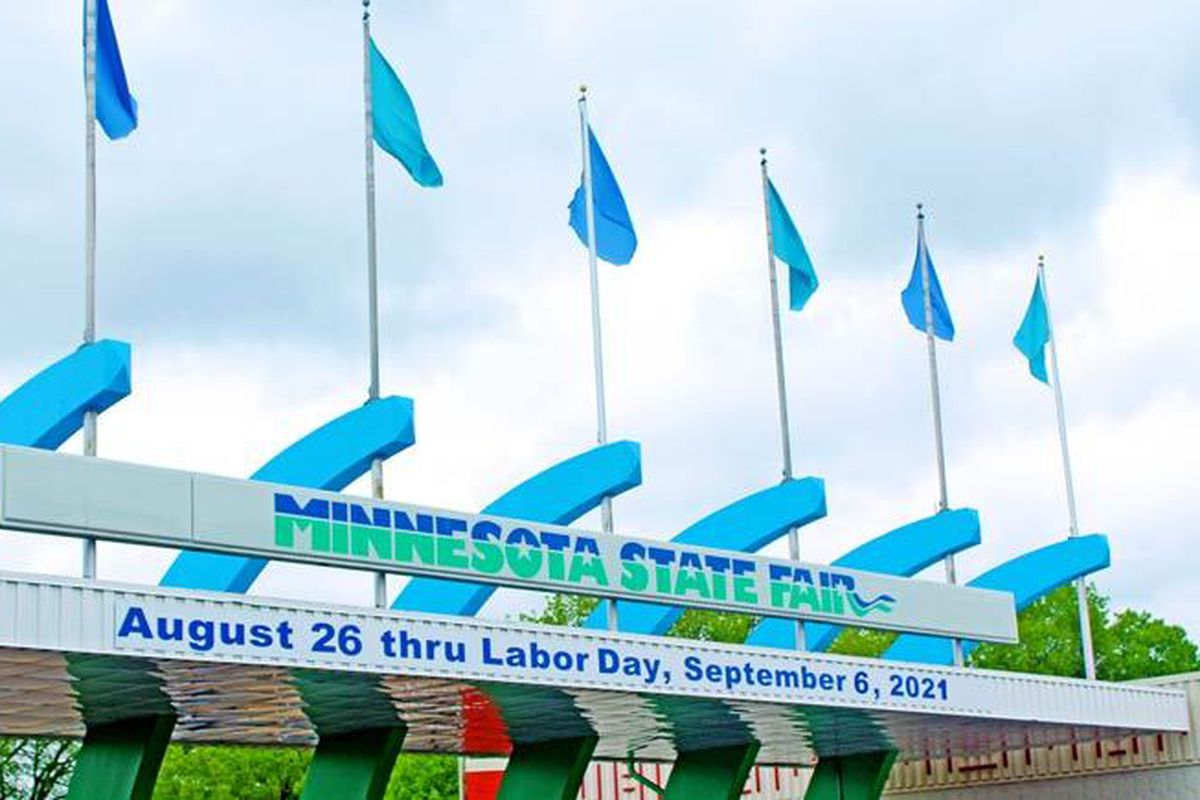 The entrance to the Minnesota State Fair advertising the 2021 dates as August 26 - Labor Day