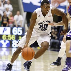 Brigham Young Cougars guard Anson Winder (20) drives as Brigham Young University defeats Portland 97-88 in NCAA men's basketball Monday, Dec. 29, 2014, in Provo.  
