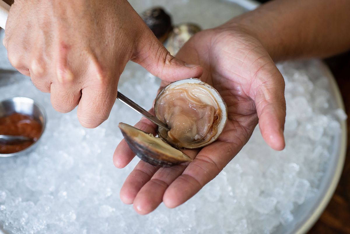Shucking a clam at Found Oyster.