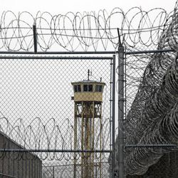 A watchtower is seen at the Wasatch facility during a media tour Thursday, Feb. 26, 2015, at the Utah State Prison in Draper. Gov. Gary Herbert said Thursday that he's opposed to the idea of allowing a state commission to pick a location to build a new prison instead of leaving the decision with the Legislature. 