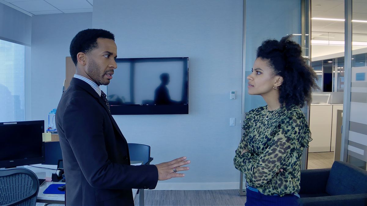 Ray Burke (André Holland) and Sam (Zazie Beetz) speaking to each other with intense expressions in High Flying Bird.