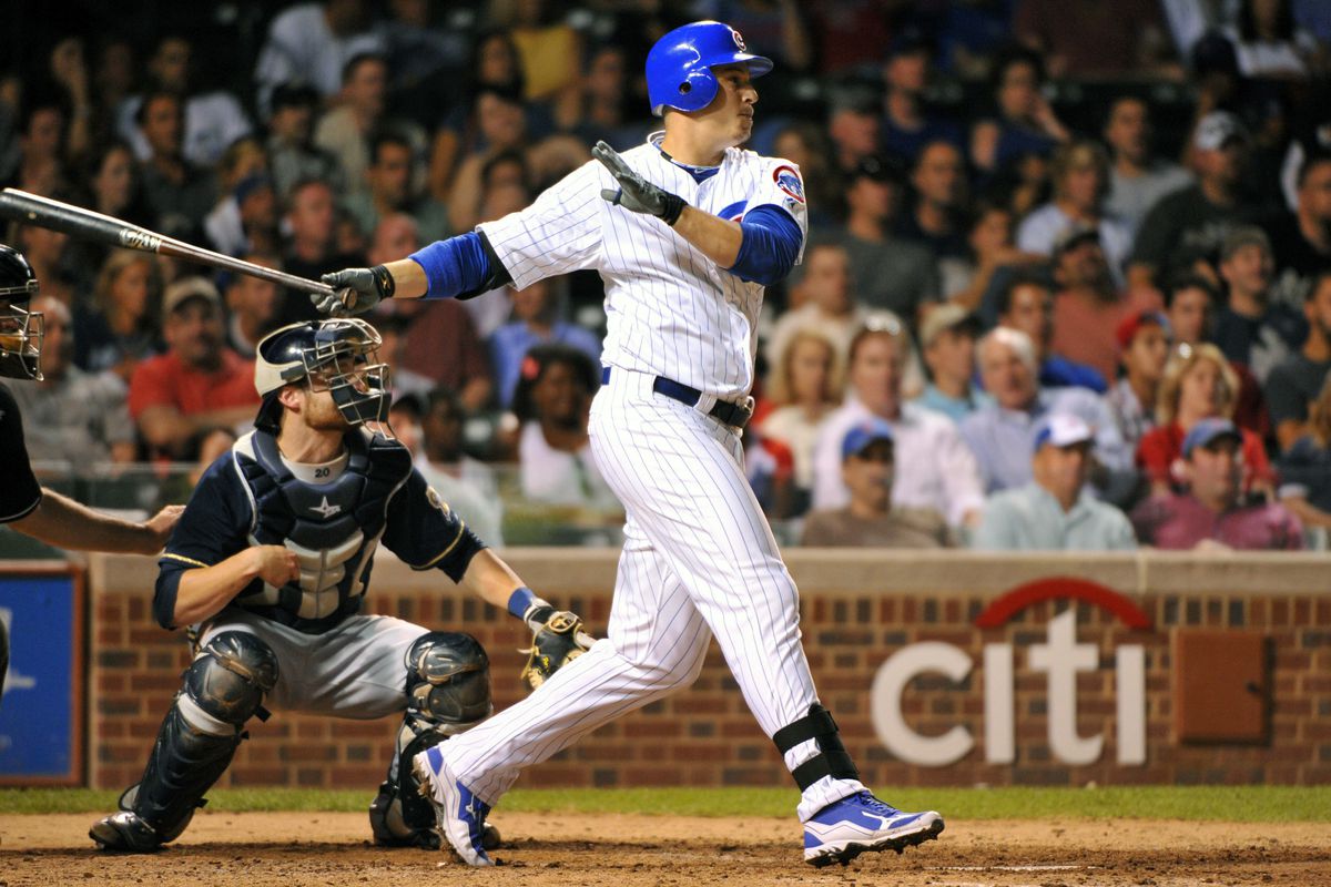 Chicago, IL, USA; Chicago Cubs first baseman Bryan LaHair hits a double against the Milwaukee Brewers at Wrigley Field. Credit: Rob Grabowski-US PRESSWIRE