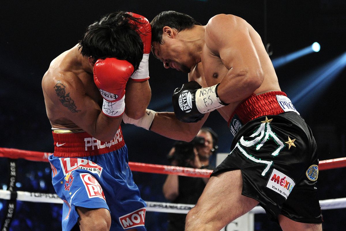 Manny Pacquiao and Juan Manuel Marquez delivered another terrific fight, plus the ninth-largest gate in Nevada history on Saturday. (Photo by Harry How/Getty Images)