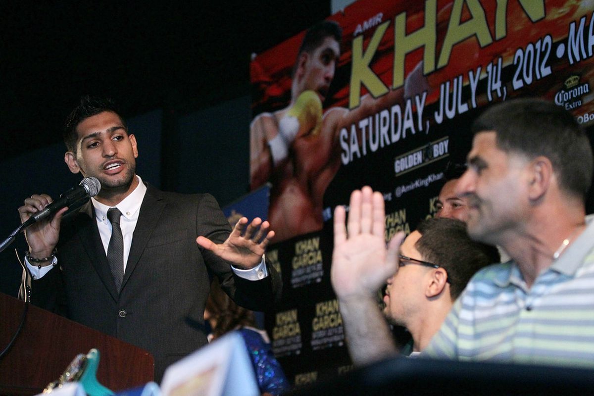 Amir Khan and Angel Garcia, Danny Garcia's father and trainer, have exchanged words a few times leading up to the July 14 fight in Vegas. (Photo by Victor Decolongon/Getty Images)