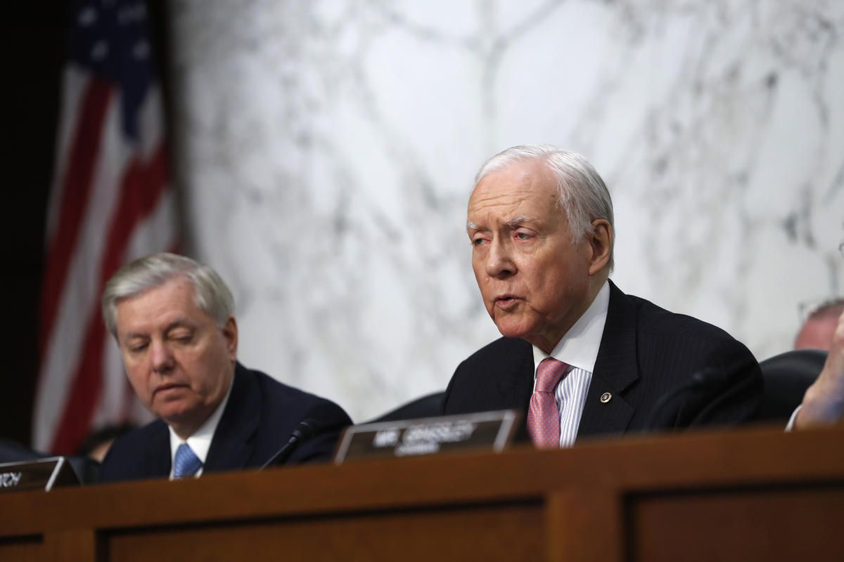 Senate Judiciary Committee member Sen. Orrin Hatch, R-Utah, right, accompanied by Sen. Lindsey Graham, R-S.C. speaks on Capitol Hill in Washington, Tuesday, March 21, 2017, during the committee's confirmation hearing for Supreme Court Justice nominee Neil