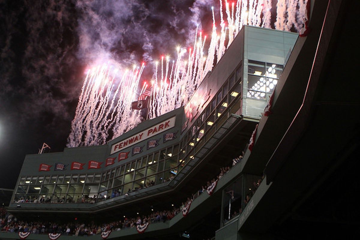 BOSTON - APRIL 04:  Fireworks explode before a game between  the Boston Red Sox and the New York Yankees on Opening Night at Fenway Park on April 4, 2010 in Boston, Massachusetts. (Photo by Jim Rogash/Getty Images)