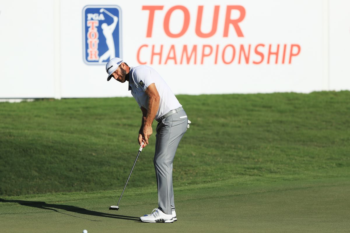 Dustin Johnson of the United States putts on the 18th green during the second round of the TOUR Championship at East Lake Golf Club on September 05, 2020 in Atlanta, Georgia.