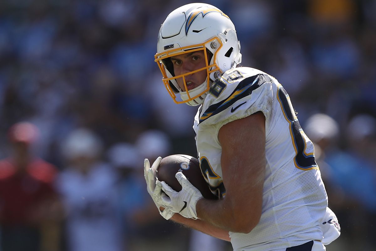 Hunter Henry of the Los Angeles Chargers eludes Bobby Okereke of the Indianapolis Colts during the first half of a game at Dignity Health Sports Park on September 08, 2019 in Carson, California.