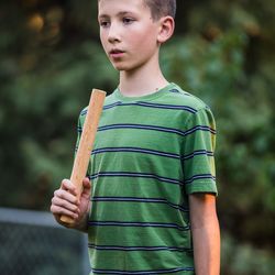Owen, 12, gets ready for his pitch during a game of kubb with his family at their house in the Salt Lake area on Monday, Sept. 17, 2018.