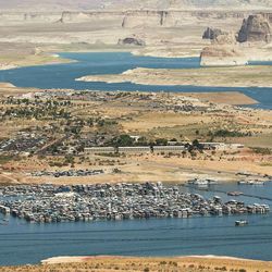 Search continues for missing boaters on Lake Powell Friday, June 21, 2013. One woman was killed and two other women were reported missing and presumed dead after an accident between a motorboat and a houseboat.