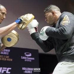 Alistair Overeem throws a punch at UFC 218 workouts.