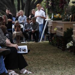 People attend the funeral of Dawna Ray Langford, 43, and her sons Trevor, 11, and Rogan, 2, who were killed by suspected drug cartel gunmen, at a family cemetery in La Mora, Sonora state, Mexico, on Thursday, Nov. 7, 2019. Three women and six of their children, all members of the extended LeBaron family, died when they were gunned down in an attack while traveling along Mexico’s Chihuahua and Sonora state border on Monday.