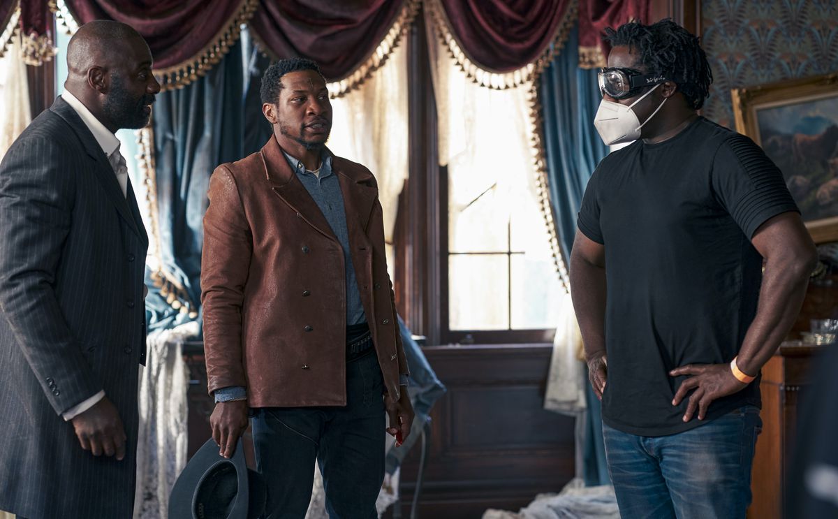 Jeymes Samuel talked to Jonathan Majors and Idris Elba on the set of The Harder They Fall