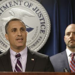 FBI Special Agent in Charge Boston Division Joseph Bonavolonta, left, and U.S. Attorney for District of Massachusetts Andrew Lelling, right, face reporters as they announce indictments in a sweeping college admissions bribery scandal during a news conference, Tuesday, March 12, 2019, in Boston. (AP Photo/Steven Senne)