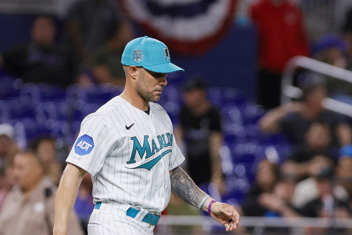 Miami Marlins manager Skip Schumaker (55) walks toward the pitching mound during the sixth inning against the New York Mets at loanDepot Park.