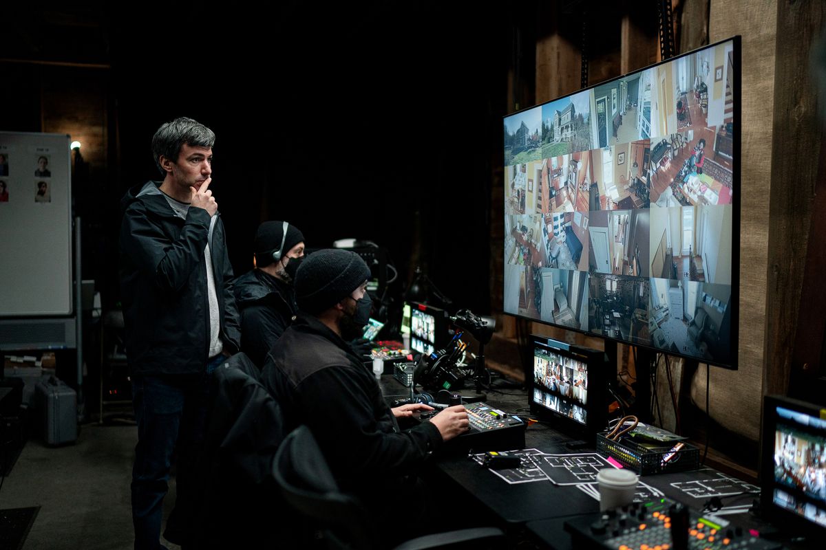 Nathan Fielder standing and looking at the control room screen in a still from “The Rehearsal”