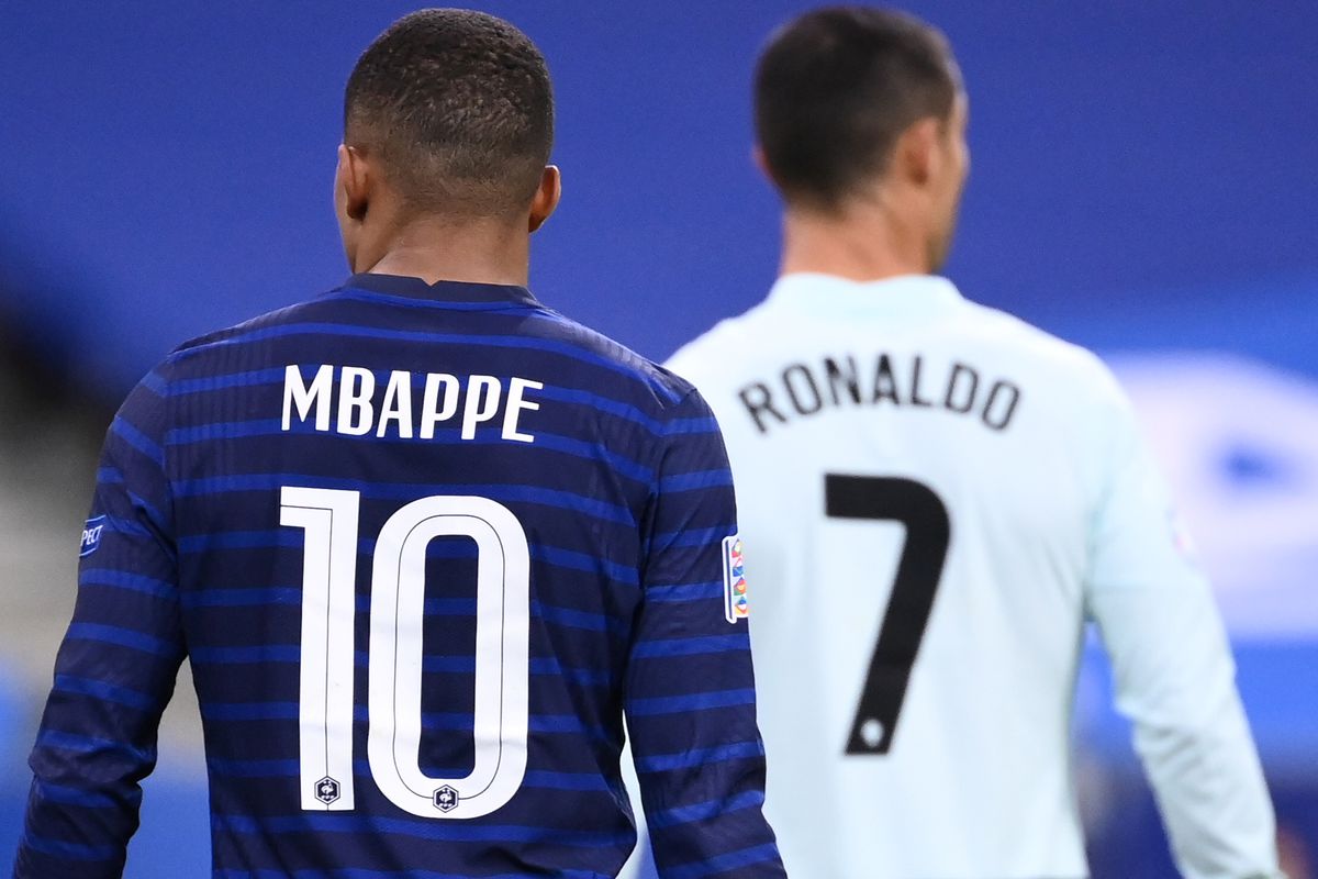 Kylian Mbappe walks with Cristiano Ronaldo - France vs Portugal - Euro 2020