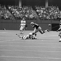 Cincinnati Bengals? Speedy Thomas (17) pounded the astro turf with his hand after a pass from Virgil Carter bounced off his chest in fourth period of a NFL game with New Orleans on Sunday, Nov. 29, 1970 in Cincinnati. Defender was Dick Absher, while other Bengal was Jess Phillips (30). Bengals won, 26-6, to go into a three-way tie in the Central Division with Cleveland and Pittsburgh. (AP Photo/GS)