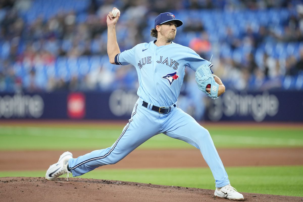 Kevin Gausman of Toronto Blue Jays pitches to the Texas Rangers during the first inning in their MLB game at the Rogers Centre on September 14, 2023 in Toronto, Ontario, Canada.