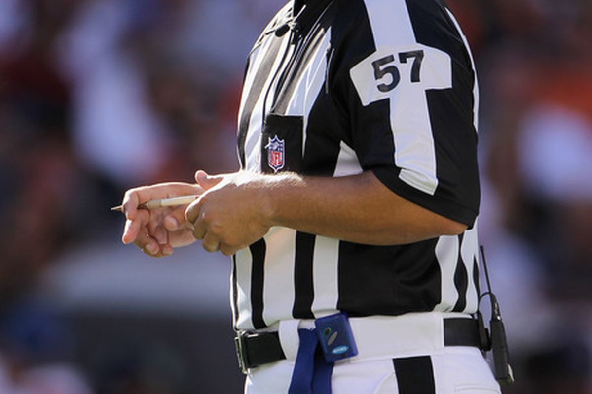 Referee Al Riveron oversees the action between the Denver Broncos and the Indianapolis Colts at INVESCO Field at Mile High on September 26 2010 in Denver Colorado. The Colts defeated the Broncos 27-13.  (Photo by Doug Pensinger/Getty Images)