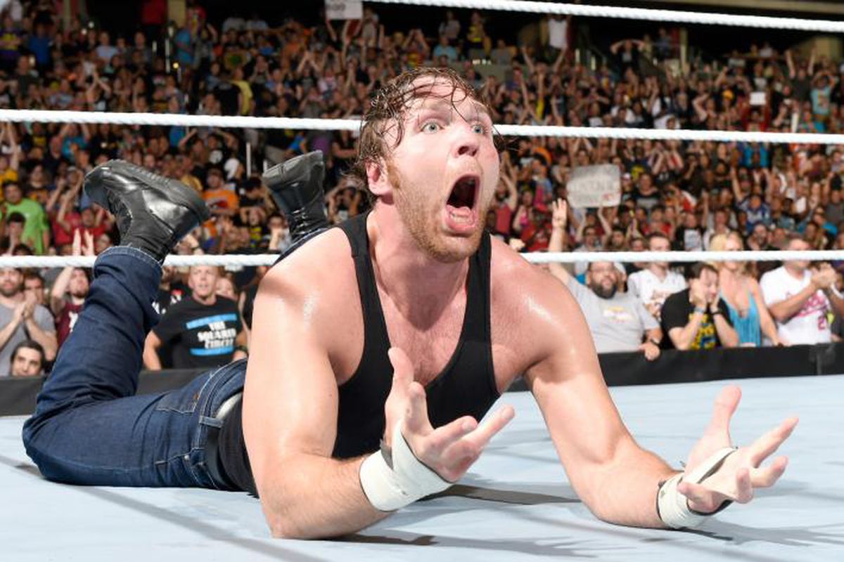 Dean Ambrose reacts during the WWE Championship triple threat