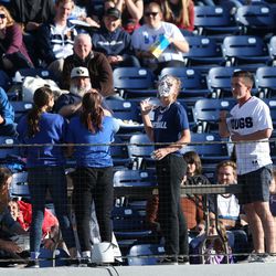 BYU fans take part in activities during the game as BYU and Utah play in a softball game at BYU in Provo on Wednesday, May 1, 2019.