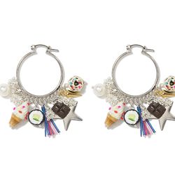 In this emoji age, we can’t get enough of Venessa Arizaga’s tongue-in-cheek designs. Shimmying desserts dangle from these earrings, while her signature friendship bracelets are embellished with the full gamut of pizza, sushi, and gummy bears.