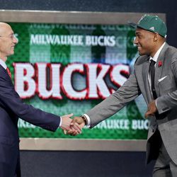 Jabari Parker of Duke is greeted by NBA Commissioner Adam Silver after being selected by the Milwaukee Bucks as the number two overall pick during the 2014 NBA draft, Thursday, June 26, 2014, in New York. 
