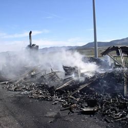 A tire blowout is being blamed for sparking a fire that destroyed a semitrailers Saturday, May 3, 2014, and caused major delays on I-15 about 25 miles north of Beaver.