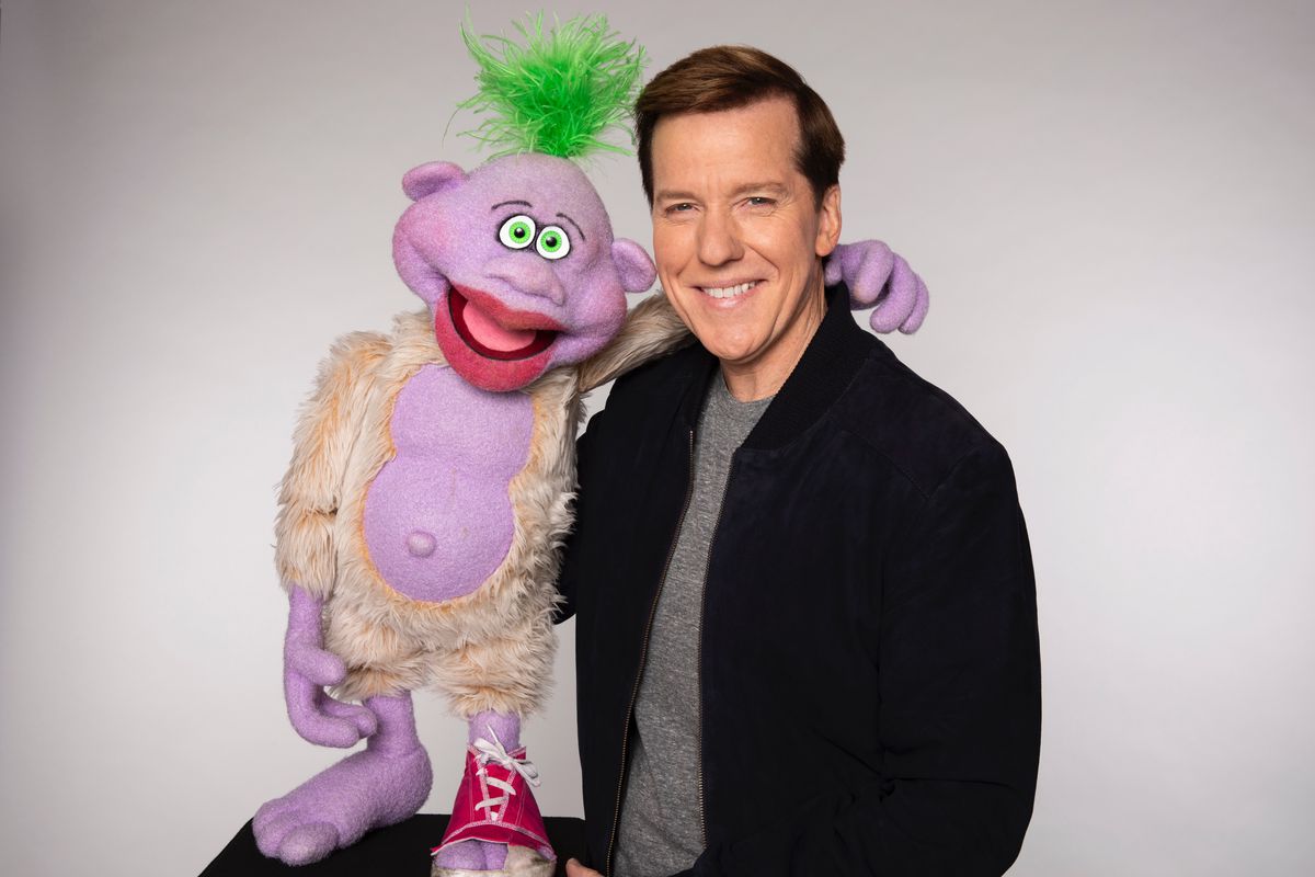 Jeff Dunham poses with this “hyperactive,” one shoe-wearing pal Peanut.