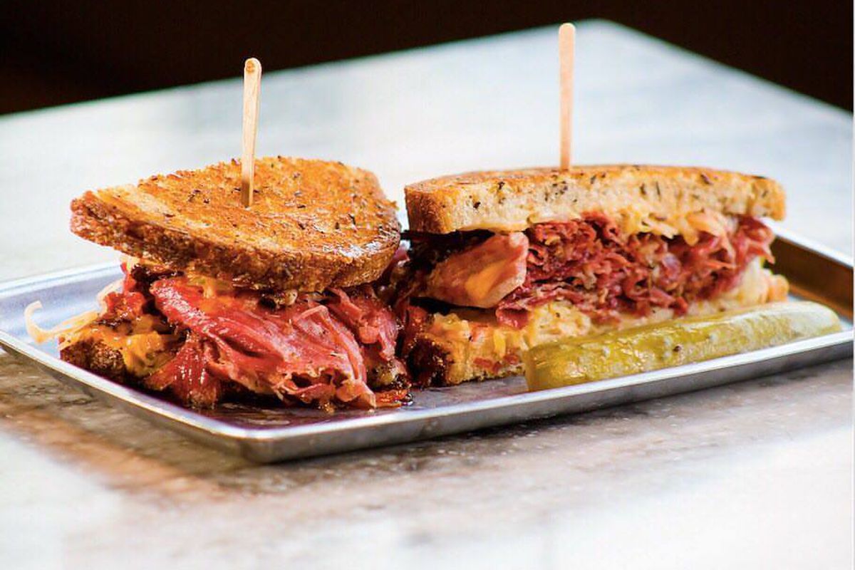 Dave's corned beef sandwich with Swiss cheese, aged sauerkraut, and Thousand Island dressing at Moody’s