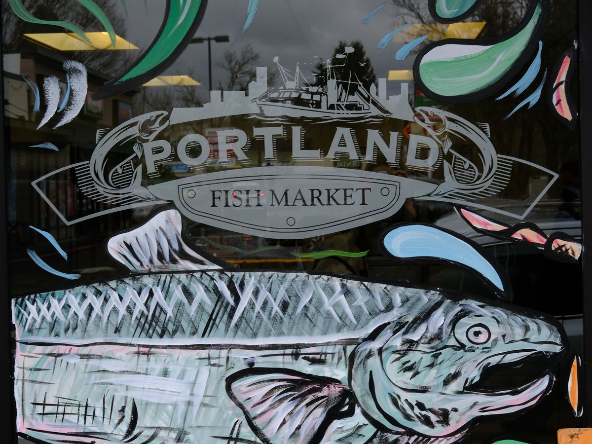 The colorful sign on the door of the Portland Fish Market