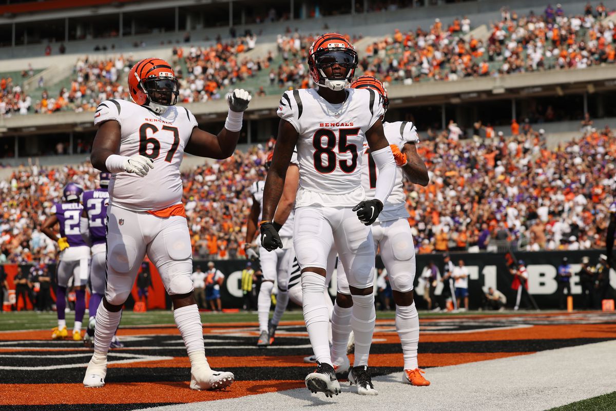 Tee Higgins #85 of the Cincinnati Bengals celebrates after catching a 2-yard touchdown pass from Joe Burrow #9 (not pictured) during the second quarter against the Minnesota Vikings at Paul Brown Stadium on September 12, 2021 in Cincinnati, Ohio.