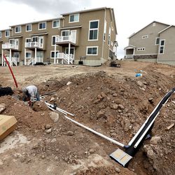 Francisco I'Arios, of MD Property Services, installs a sprinkler system in Herriman on Tuesday, April 18, 2017. The Utah Division of Water Resources is urging people to be water-wise and refrain from landscape watering at this point.