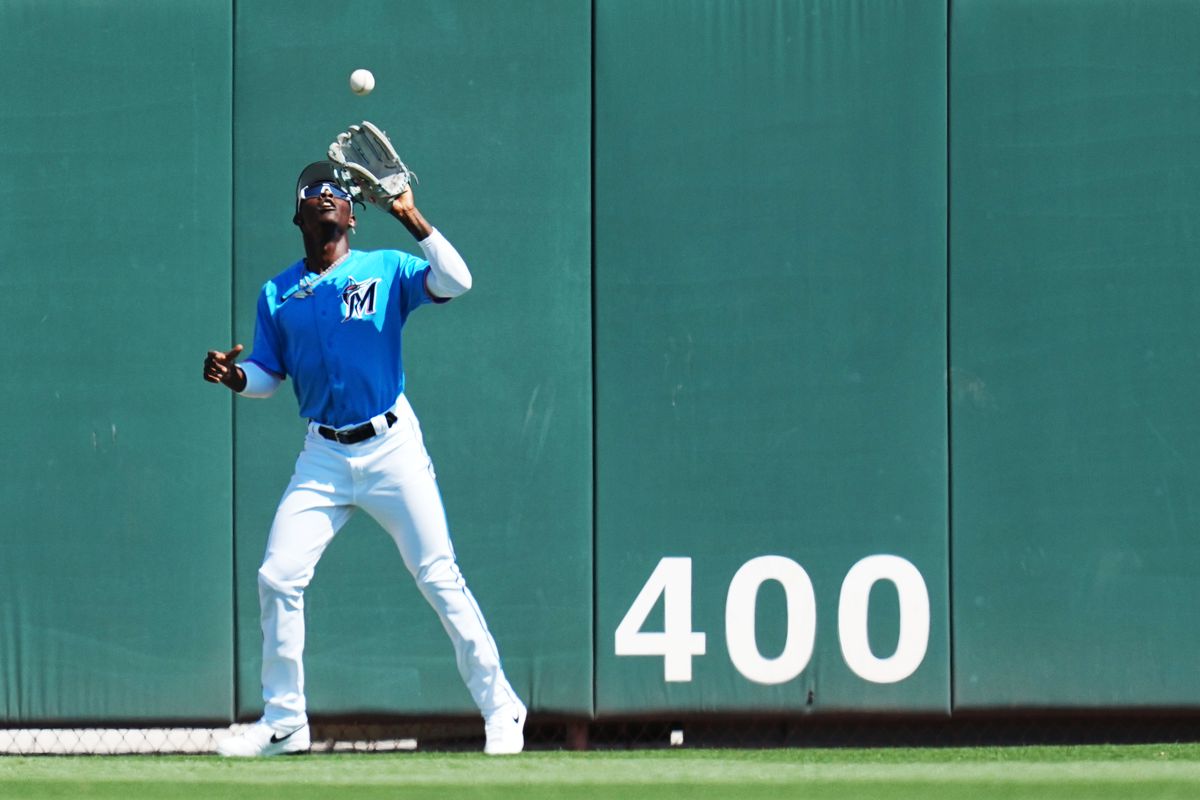 Jupiter, Florida, USA; Miami Marlins center fielder Jazz Chisholm Jr. (2) catches a fly ball for an out in the first inning against the New York Mets at Roger Dean Stadium.