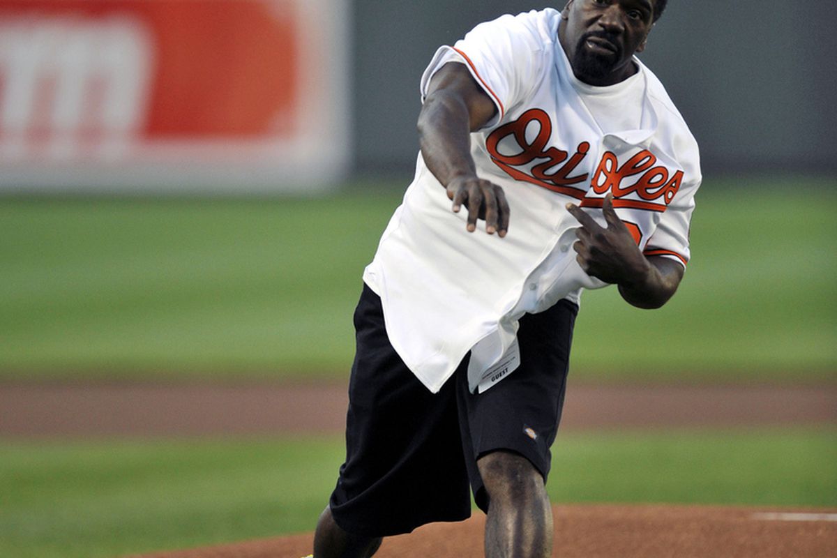 Ravens' Ed Reed throws out 1st pitch at recent Orioles game (photo credits: Joy R. Absalon-US PRESSWIRE)