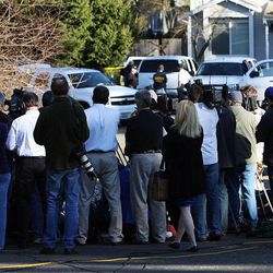 Detective Ed Troyer of the Pierce County Sheriff's Department talks with the press near the home of Josh Powell in Graham, Wash., Monday, Feb. 6, 2012.