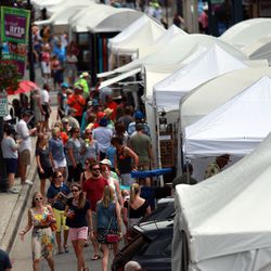 People stroll through the 45th annual Park City Kimball Arts Festival in Park City on Saturday, Aug. 2, 2014.