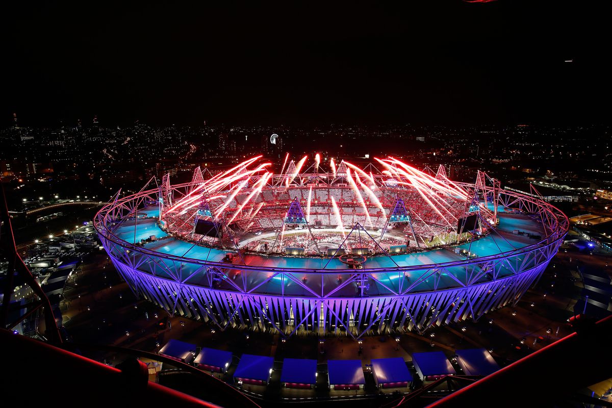 LONDON, ENGLAND - JULY 27:  Fireworks ignite over the Olympic Stadium during the Opening Ceremony for the 2012 Olympic Games on July 27, 2012 at Olympic Park in London, England.  (Photo by Jamie Squire/Getty Images)