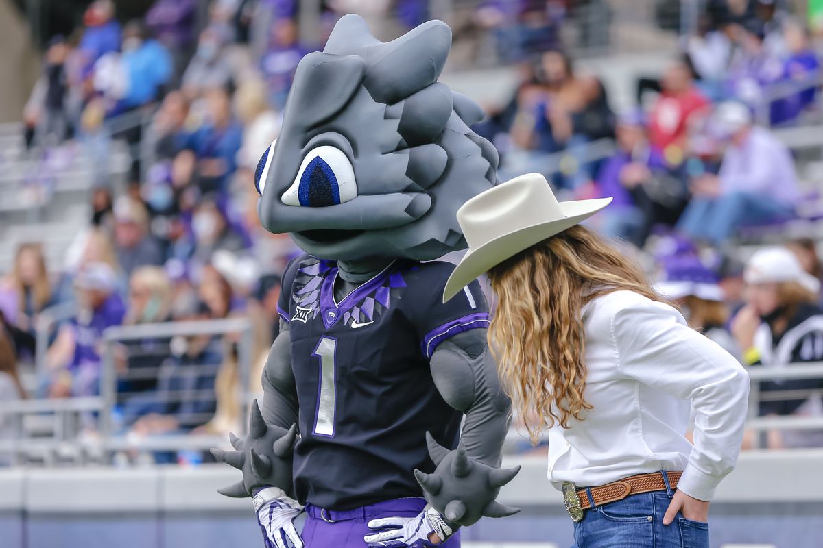TCU Horned Frogs spirit squad performs with Superfrog during the game between the TCU Horned Frogs and the Oklahoma Sooners on October 24, 2020 at Amon G. Carter Stadium in Fort Worth, Texas.