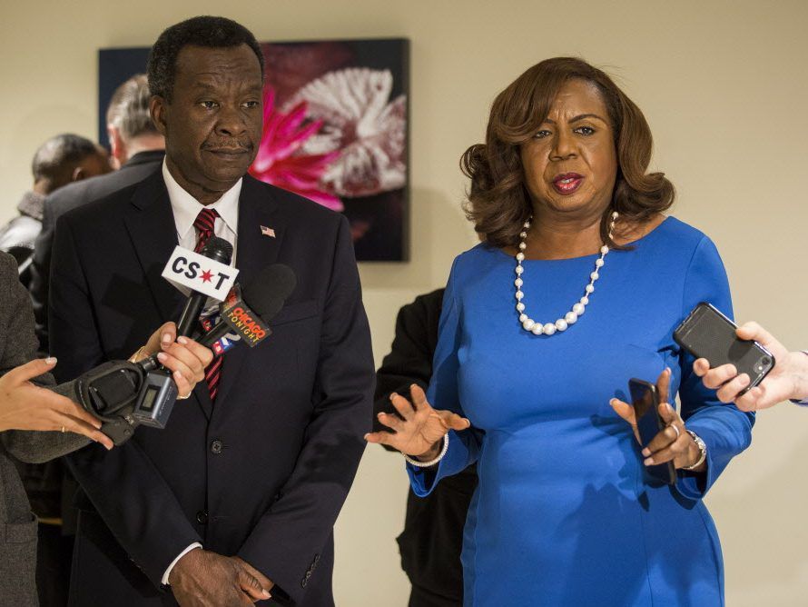 Chicago mayoral candidates Willie Wilson and Dorothy Brown speak to reporters outside the Board of Elections after Wilson withdrew his objection to Brown Jan. 15. | Sun-Times file photo